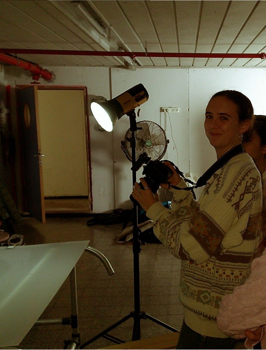 Inbal photographing in the studio